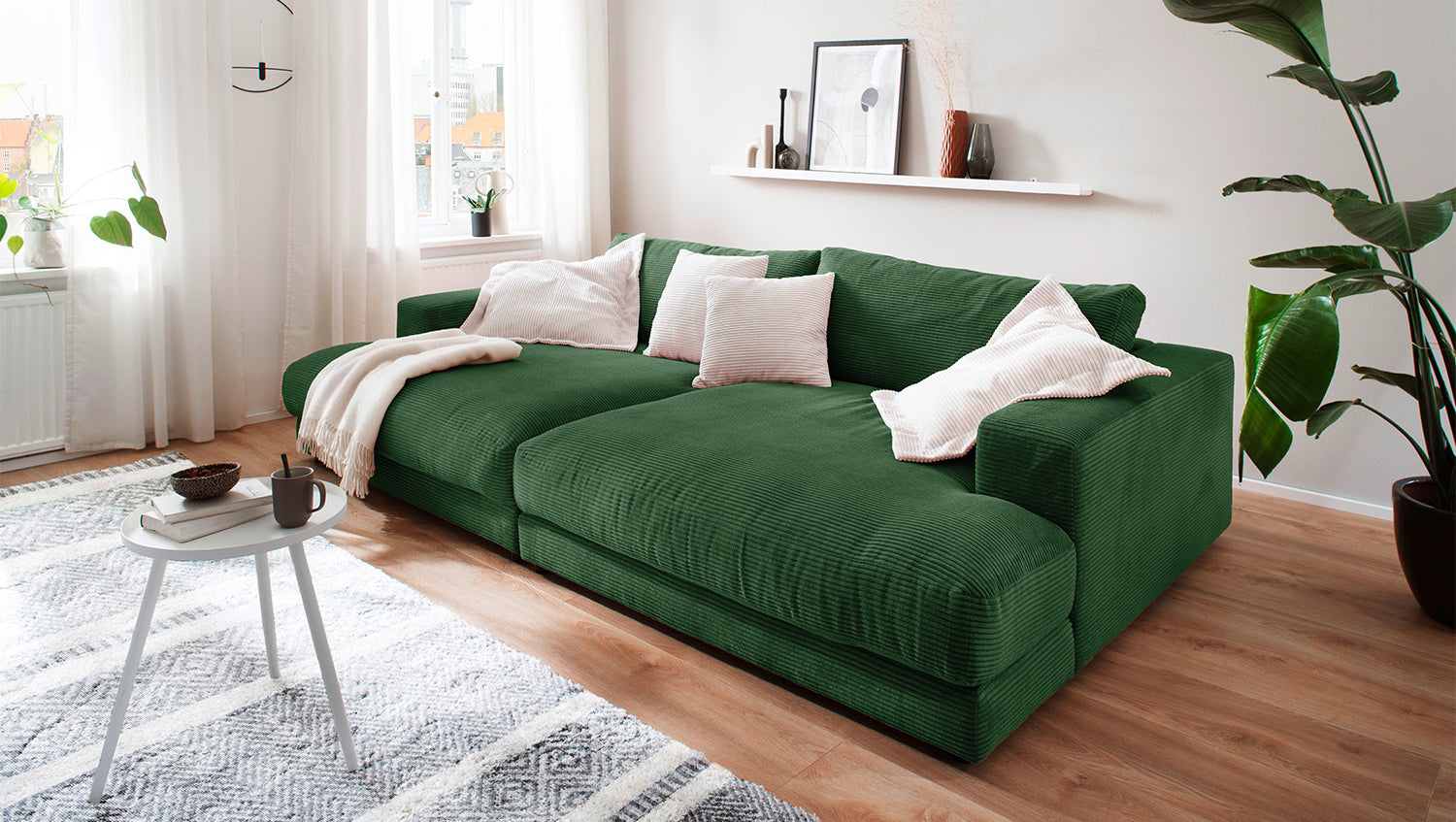 KAWOLA Big Sofa MADELINE Cord smaragd, 290 x 190, ohne Holztablett